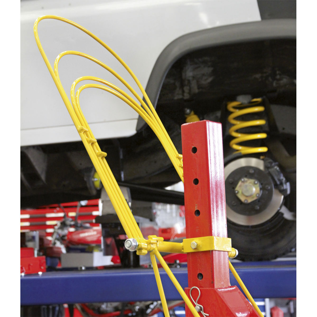 Coil Spring Compressor Restraint System